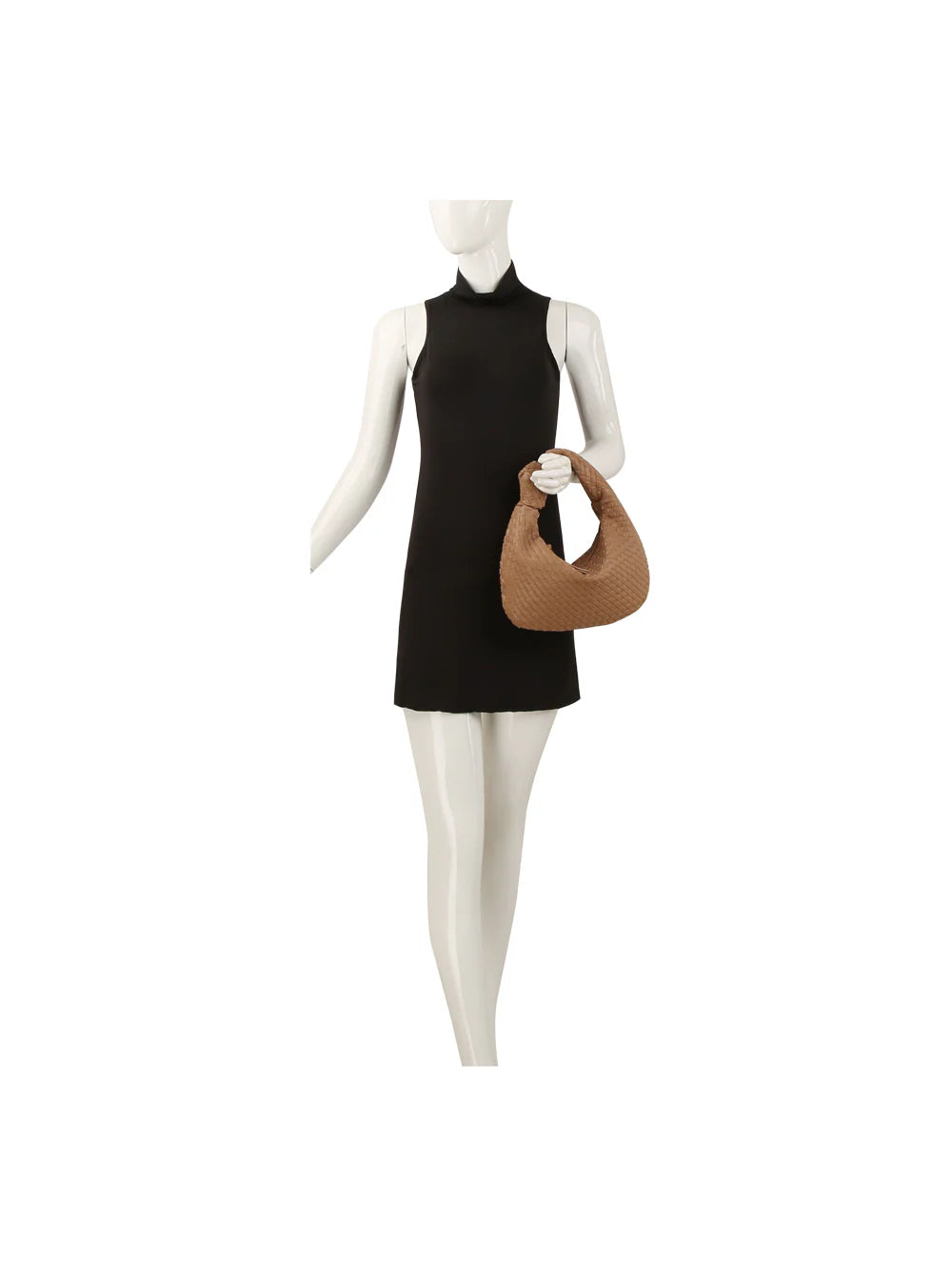 A mannequin wearing a sleeveless black high-neck mini dress holds the Woven Classic Hobo Handbag, a small textured brown faux leather bag with a single strap, in its right hand.