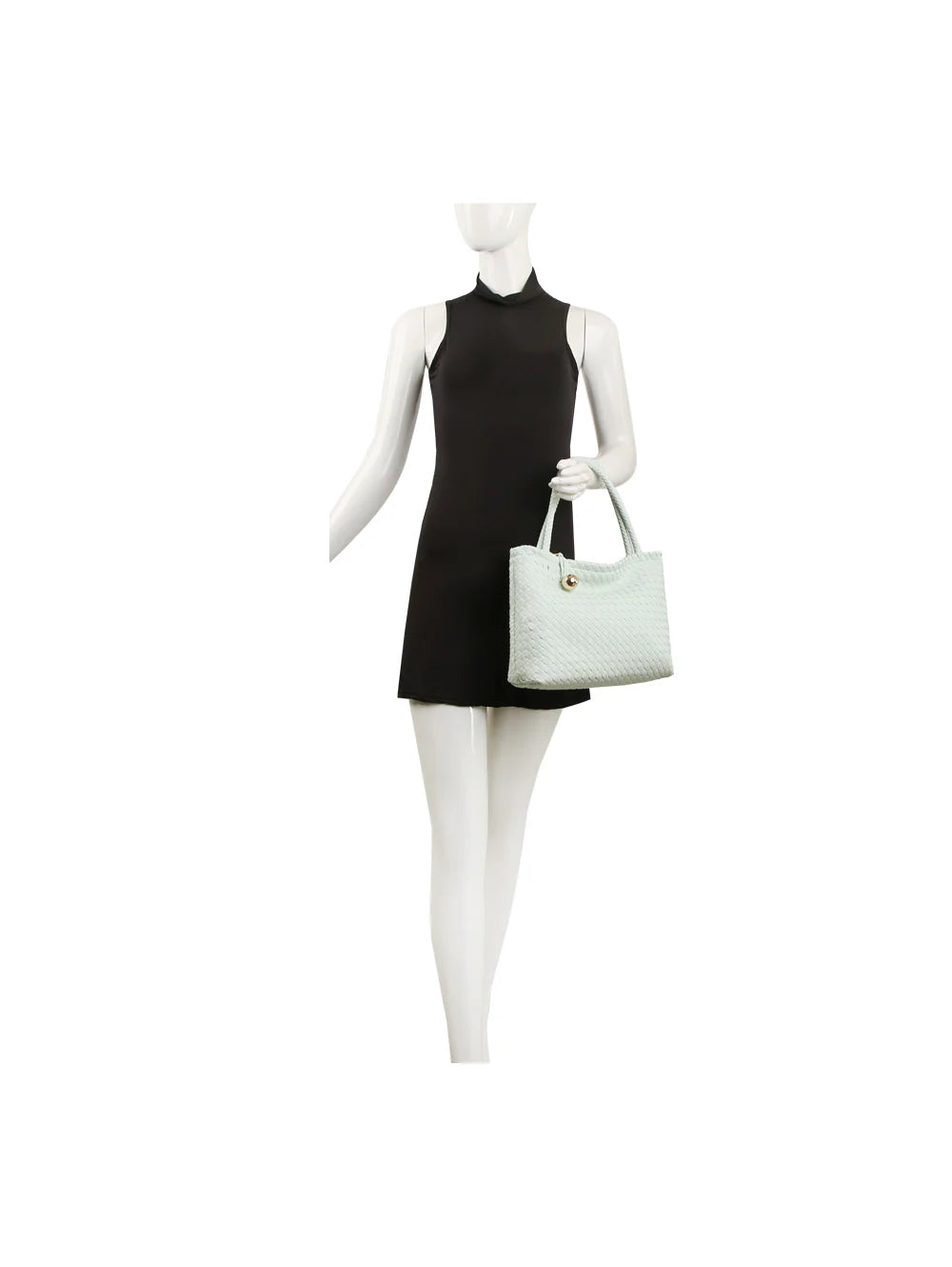 A mannequin in a sleeveless black mini dress holds the Golden Ball Accented Woven Fashion Handbag in its left hand, standing against a plain white background.
