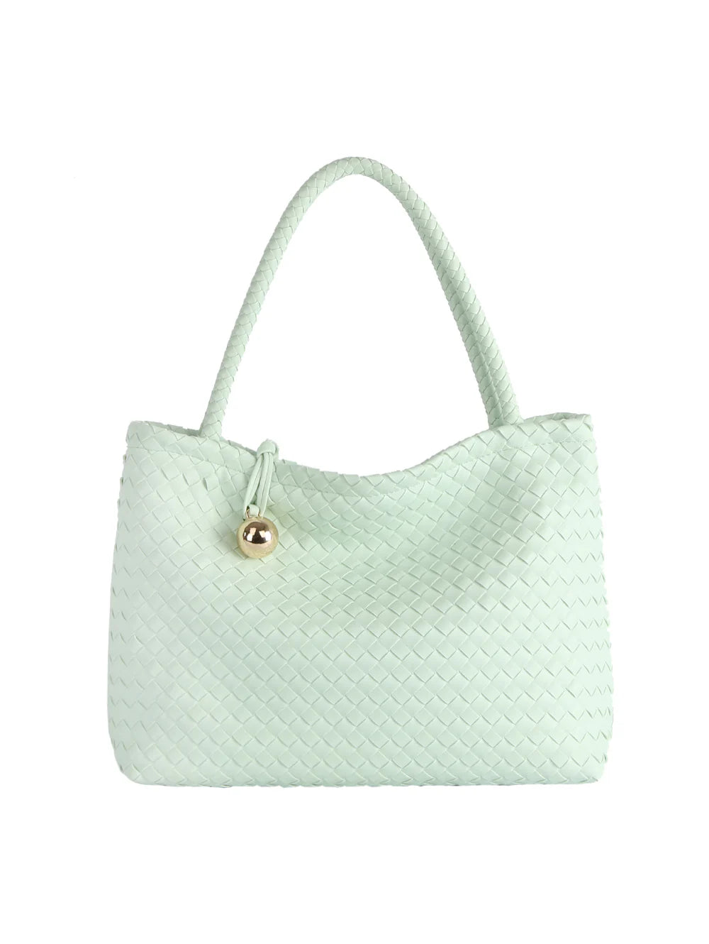 The Golden Ball Accented Woven Fashion Handbag features light mint green faux leather, two handles, a gold round charm, gold-toned hardware, and a detachable strap, shown against a white background.