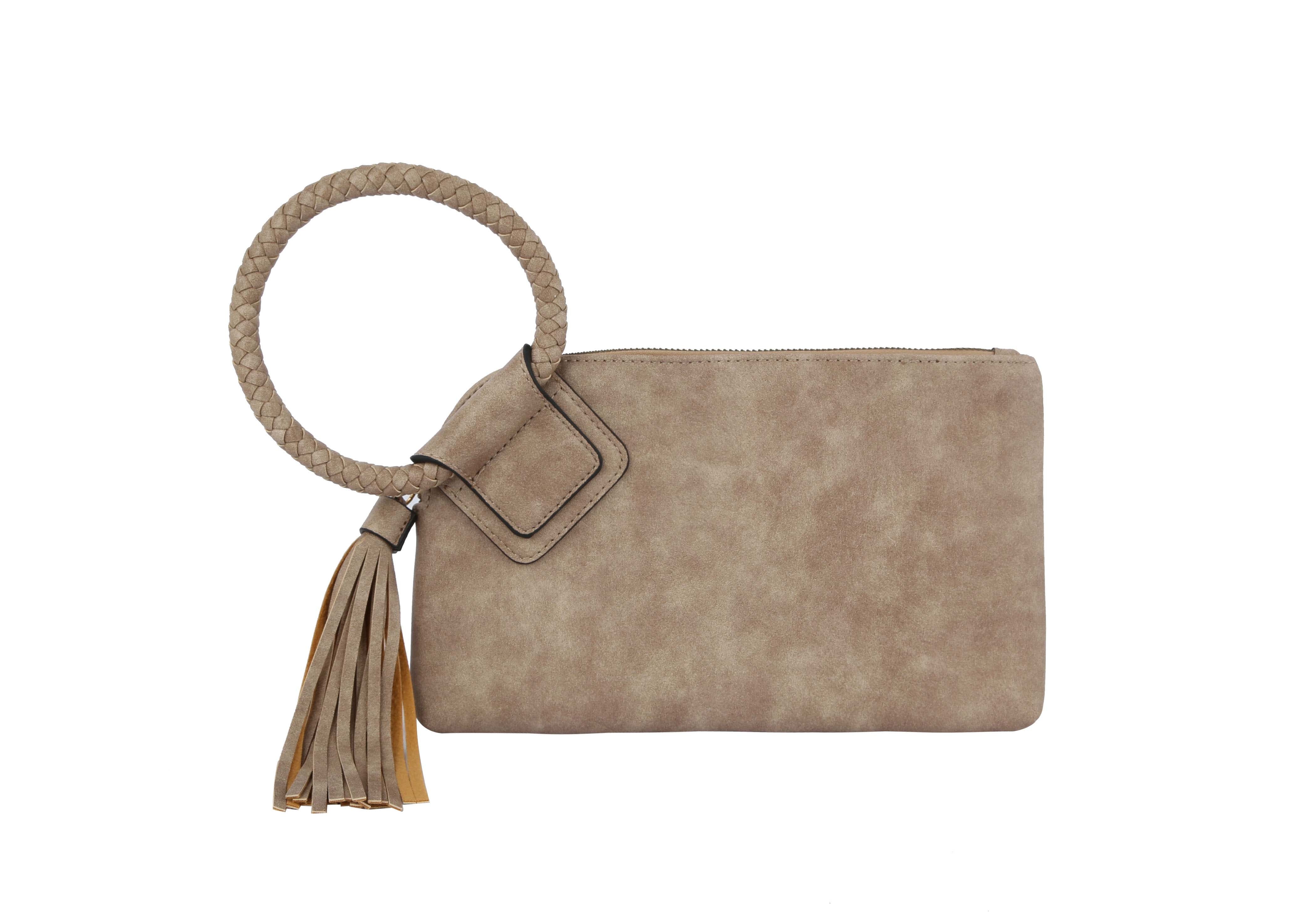 The Braided Handle Wristlet Clutch features beige suede, a large braided wrist strap, decorative tassel detail, and an interior zip pocket for essentials, displayed on a white background.