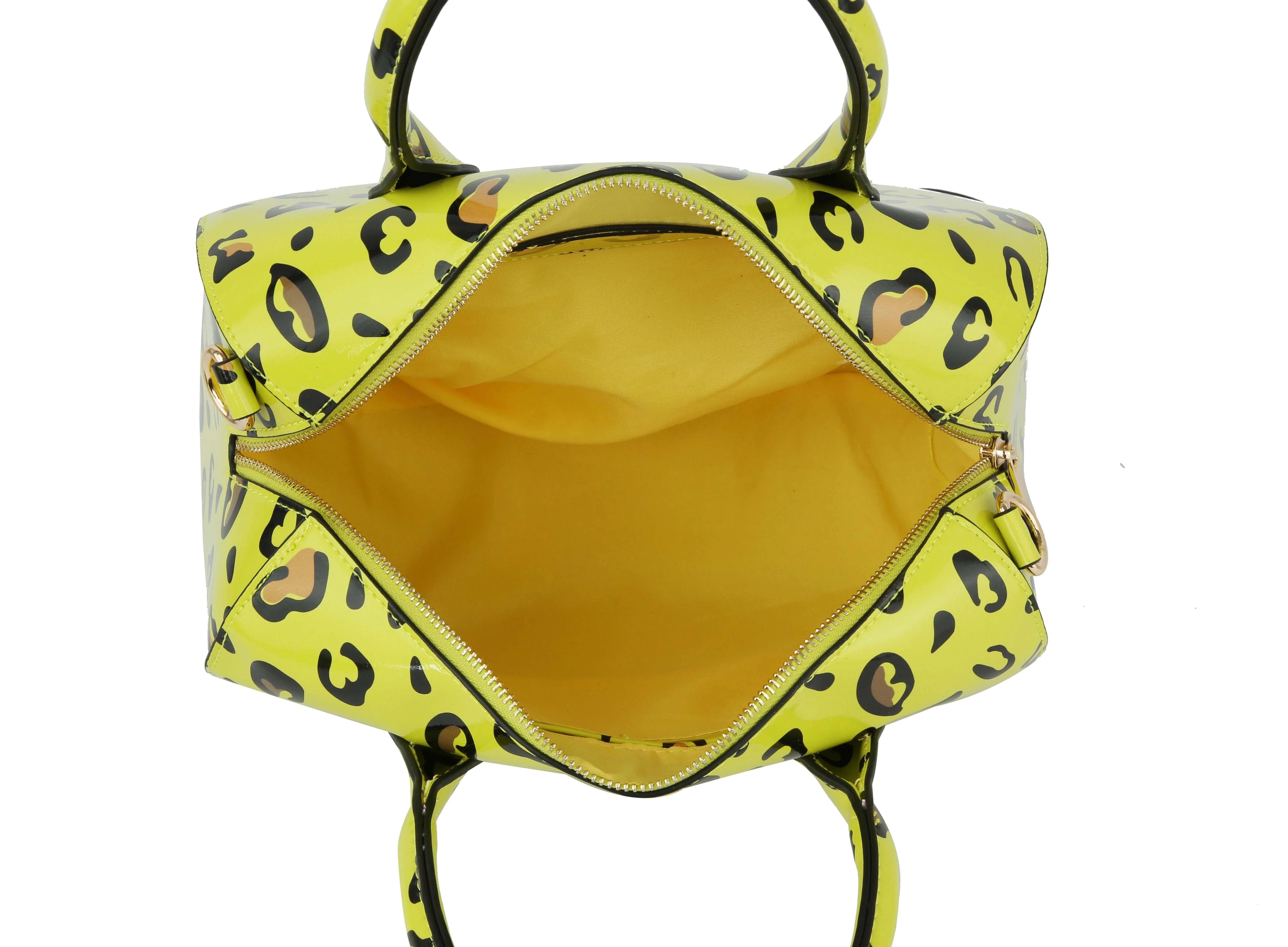 The Leopard Art Print Satchel Handbag Set features a bold yellow leopard print and a spacious interior, shown open from above—perfect for pairing with your matching wallet.