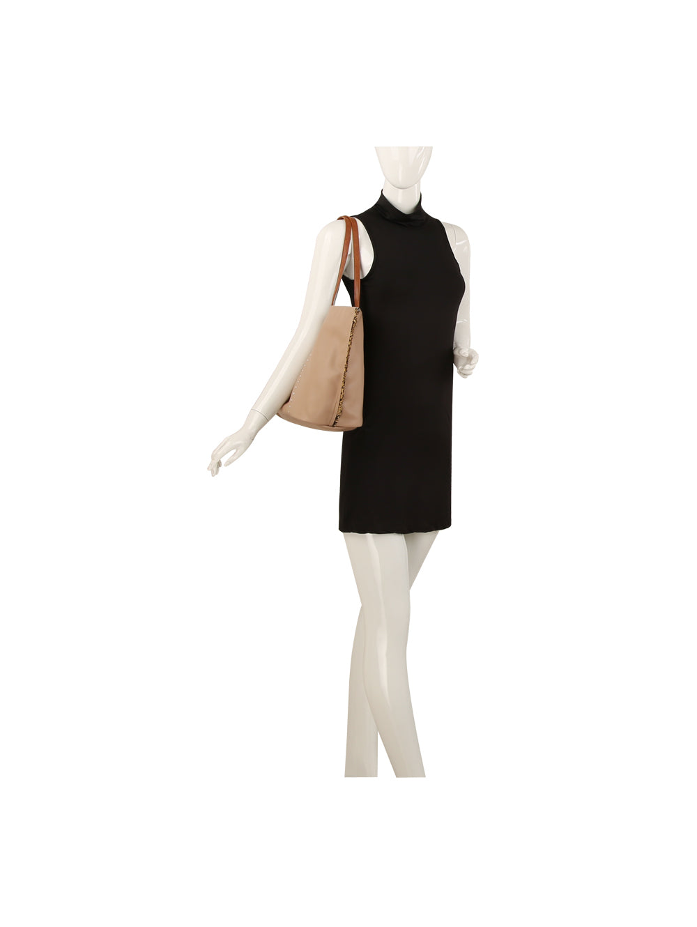 A mannequin in a sleeveless black dress holds the Leopard Trim Slouch Tote Handbag, featuring brown straps, standing against a white background.