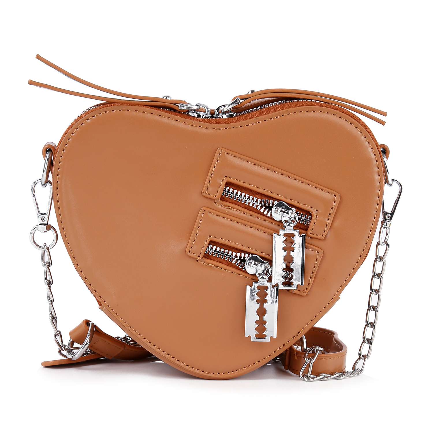 The Modern Heart Petite Shoulder Bag is a tan, heart-shaped handbag with two diagonal zippered pockets featuring silver razor blade zipper pulls and a chain-leather shoulder strap for a chic look.