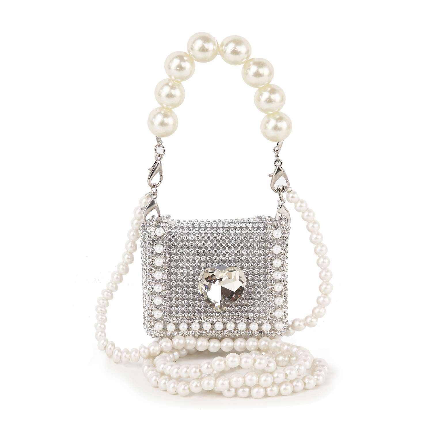 The Pearl And Rhinestone Accented Ultra Petite Evening Bag features silver faux leather, rhinestone accents, a heart-shaped gem, pearl beaded handle, and extra strap—perfect for adding sparkling glamour to any outfit.