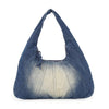 The Distressed Denim Hobo Handbag features a blue crescent shape, zip closure, slightly faded center front, and is tablet compatible—perfect as a stylish shoulder bag or purse.