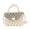 The Ultra Petite Pearl Evening Bag features a pearl handle and shoulder strap, crafted from large white and silver pearls for a shiny, eye-catching look that stands out at any event.