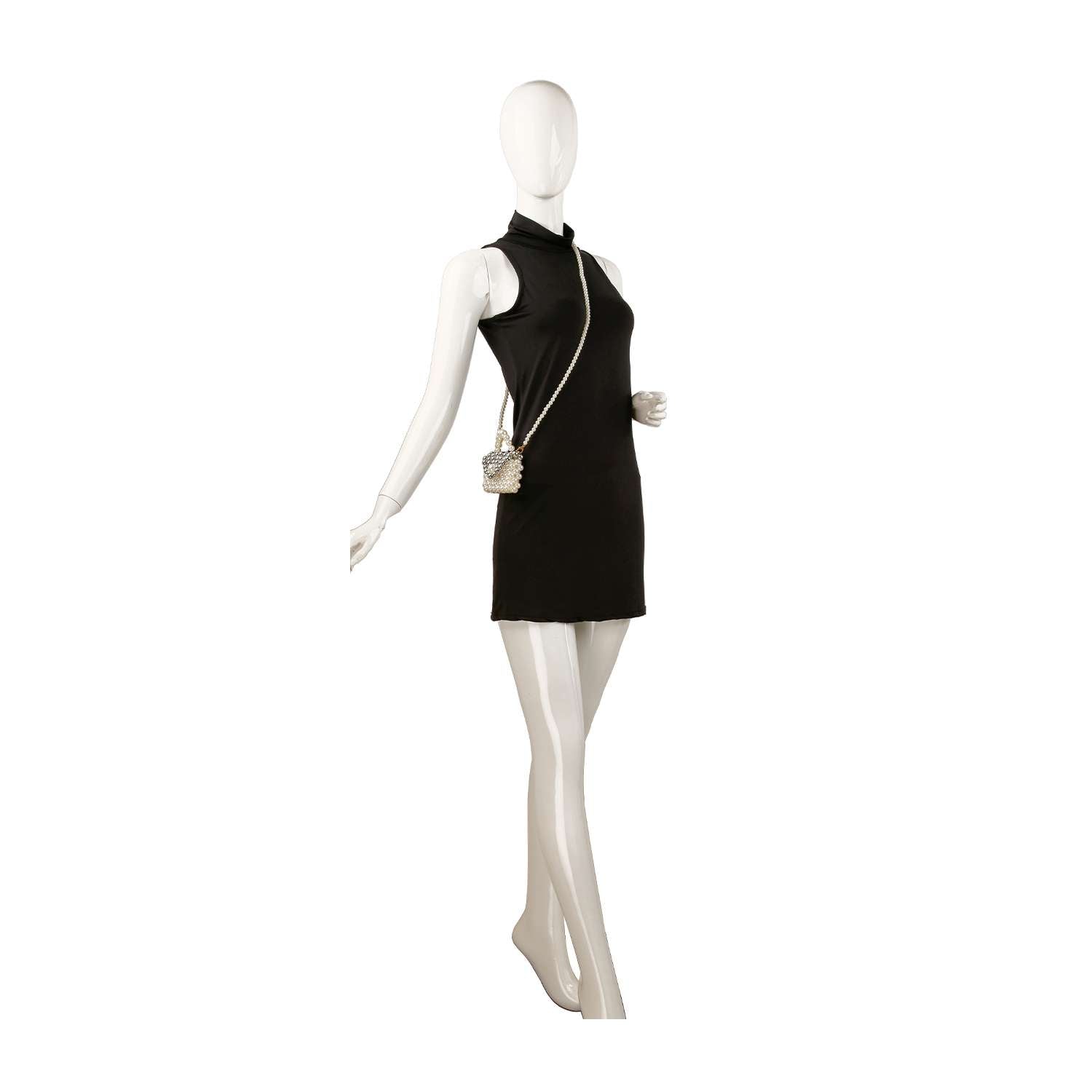 A white mannequin poses in a sleeveless black mini dress, accessorized with the Ultra Petite Pearl Evening Bag, set against a plain white background.
