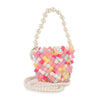 The Acrylic Beaded Colorful Evening Bag features interwoven pastel beads, pearl accents on the handle, a long matching strap, and is shown against a white background.