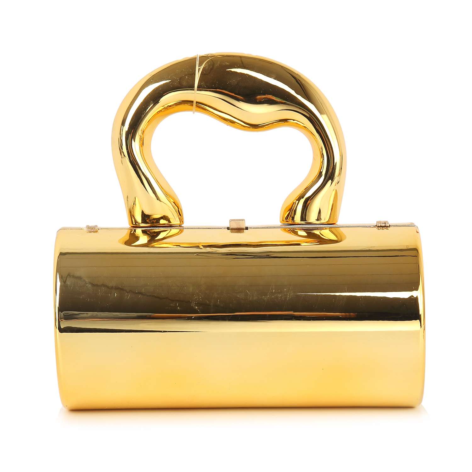 The Patent Petite Evening Bag is a shiny gold, cylindrical faux leather evening bag with a large curved Art Deco handle on top, shown upright against a white background.