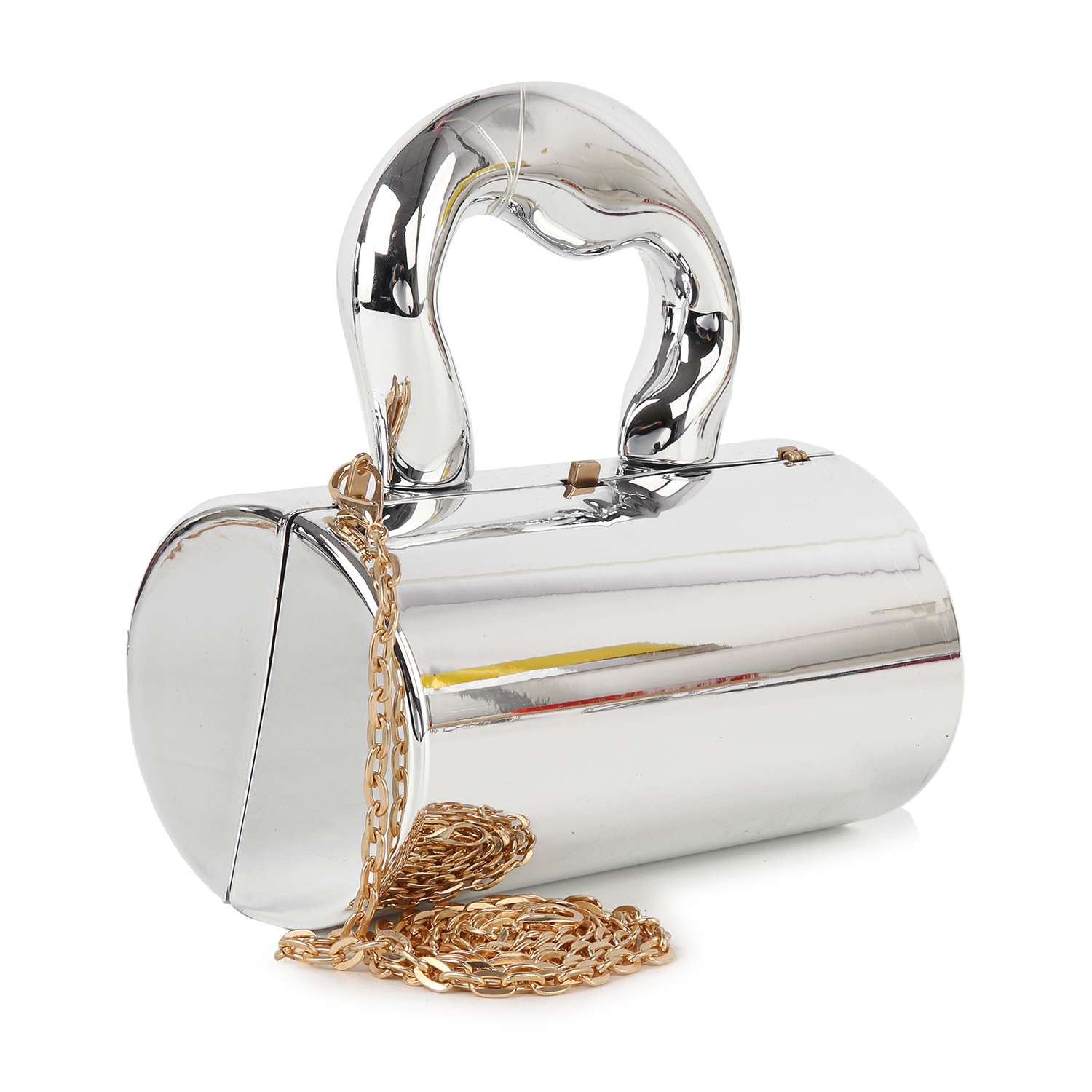 The Patent Petite Evening Bag is a shiny, cylindrical silver faux leather clutch with an Art Deco handle and a gold chain strap, shown draped in front against a white background.