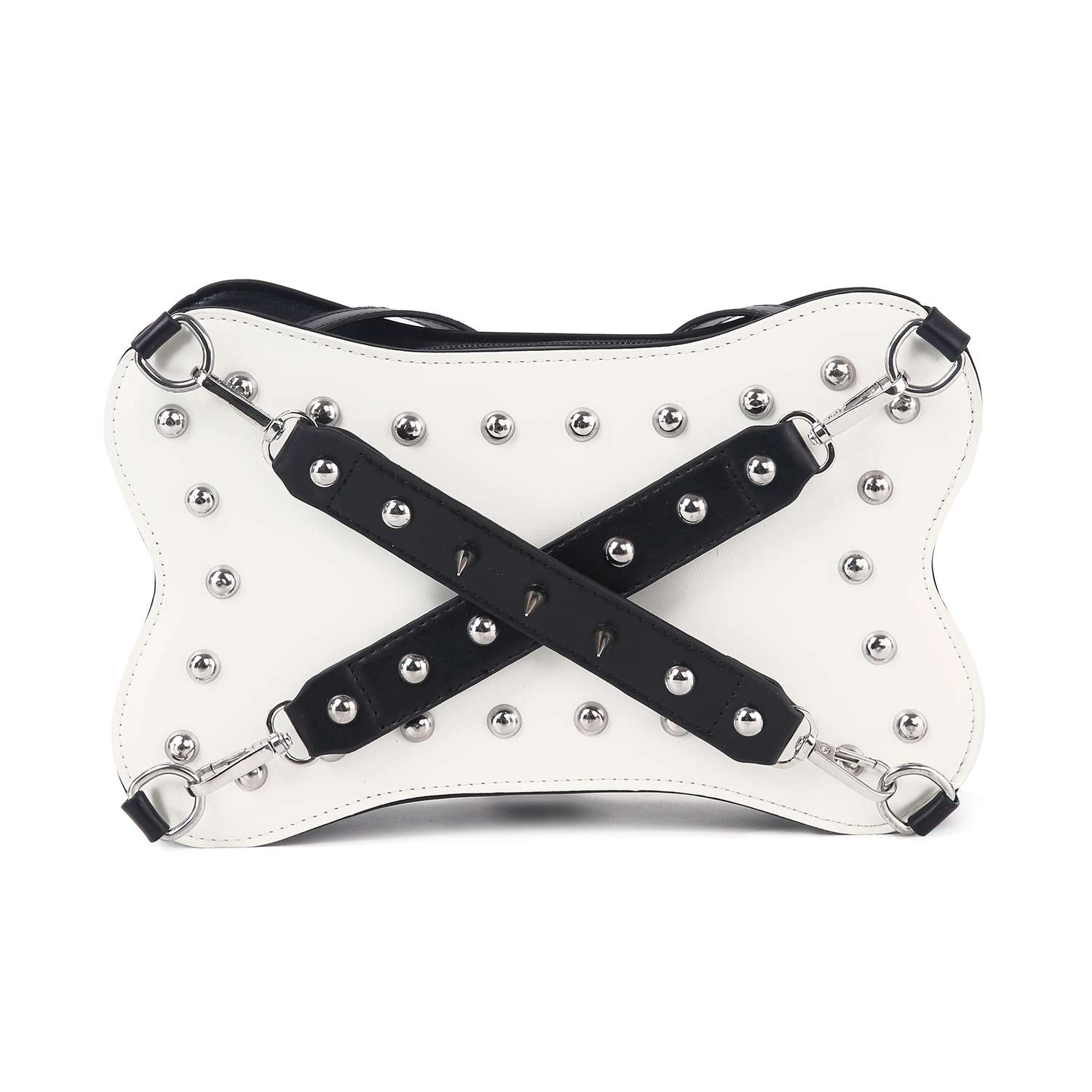 The Studded Belted Shoulder Bag features white faux leather with black X-shaped straps, silver studs, and metal rings for a bold, edgy look. Stylish and tablet compatible.