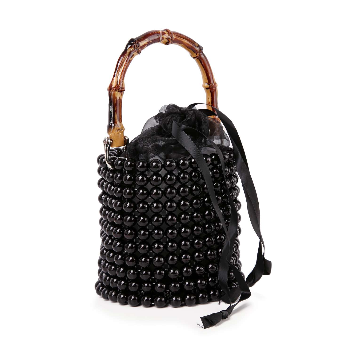 The Beaded Unique Evening Bag is a petite bucket bag made from glossy black beads, featuring a bamboo handle and a sleek black ribbon drawstring closure at the top.