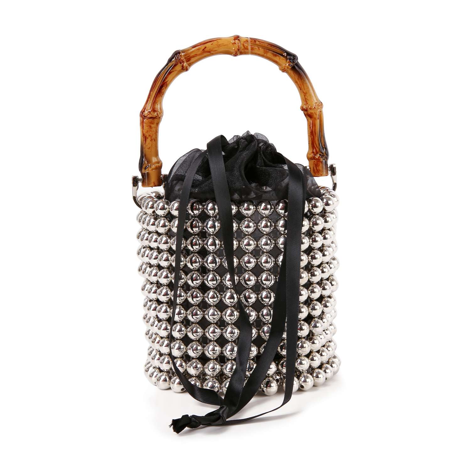 The Beaded Unique Evening Bag is a petite bucket bag with a bamboo handle, shiny silver beads, a stylish beaded silhouette, black drawstring closure, and long black ribbon ties.