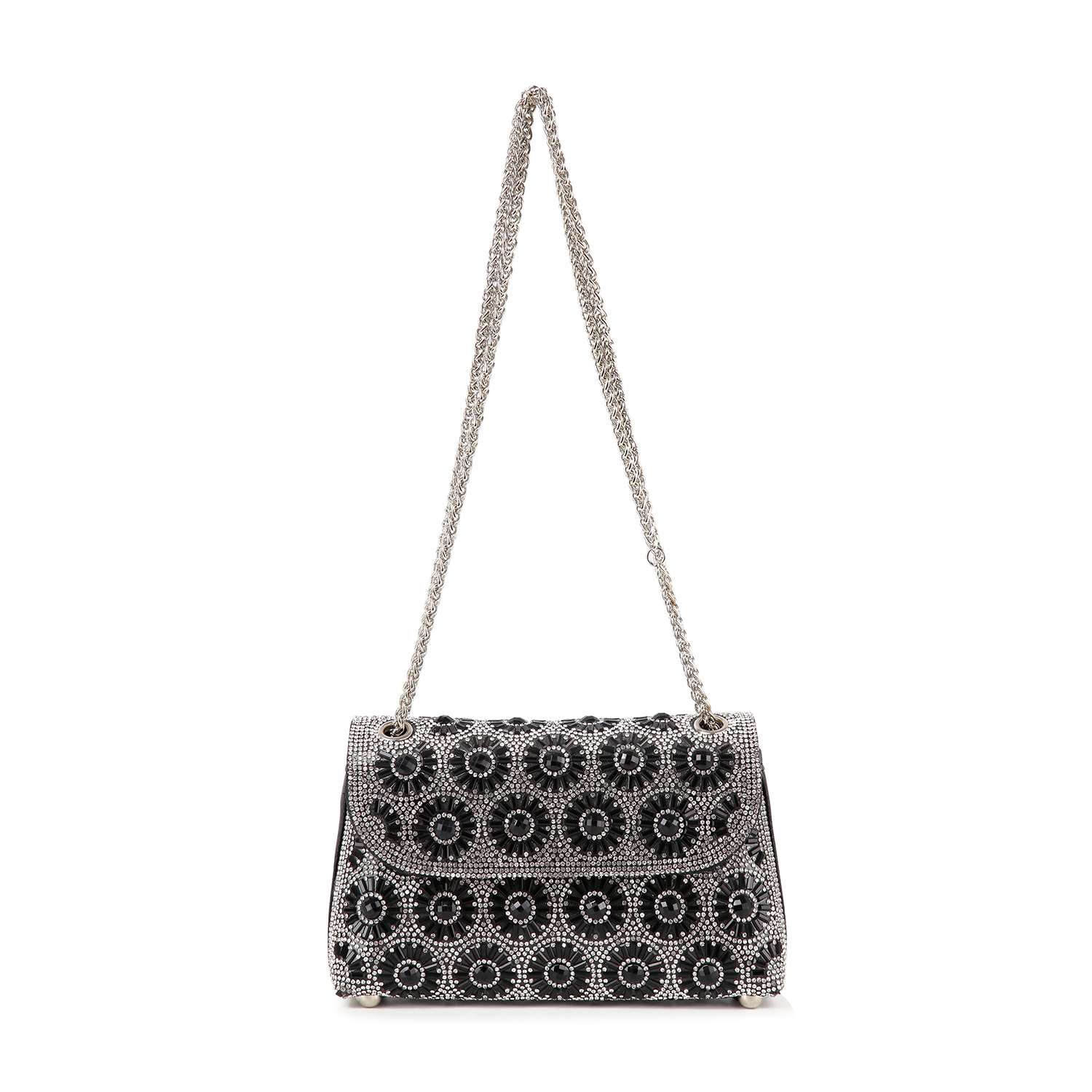 The Stunning Rhinestone Design Shoulder Bag is a black faux leather handbag featuring a long silver chain strap and circular silver embellishments in a floral pattern across the flap and front.