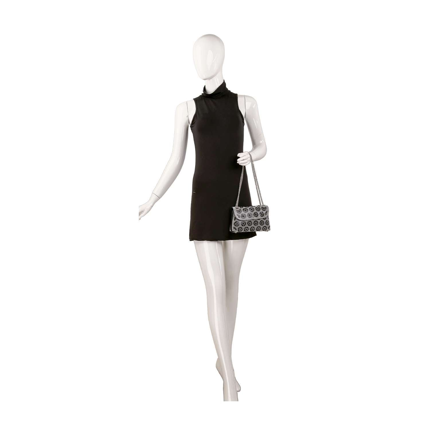 A mannequin in a sleeveless black mini dress holds the Stunning Rhinestone Design Shoulder Bag, featuring a circular pattern and chain strap, posed against a plain white background.