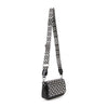 The Guitar Strap Accented Studded Shoulder Bag is a small black faux leather shoulder bag featuring silver studs on the front and a wide, adjustable black-and-white zigzag strap. Displayed against a plain white background.
