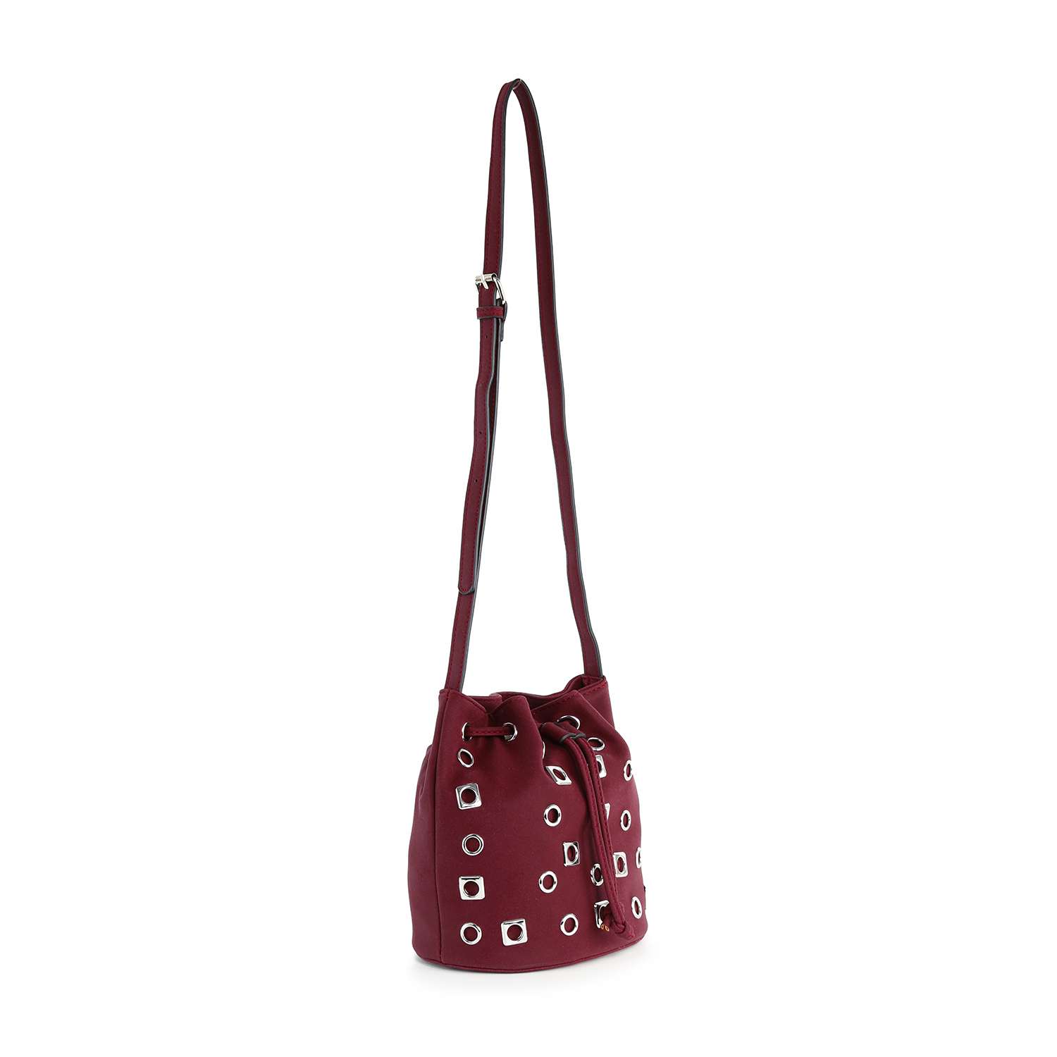 The Rivited Drawstring Hobo Shoulder Bag features a structured burgundy design with silver grommet accents, silver-tone hardware, and a long adjustable shoulder strap.