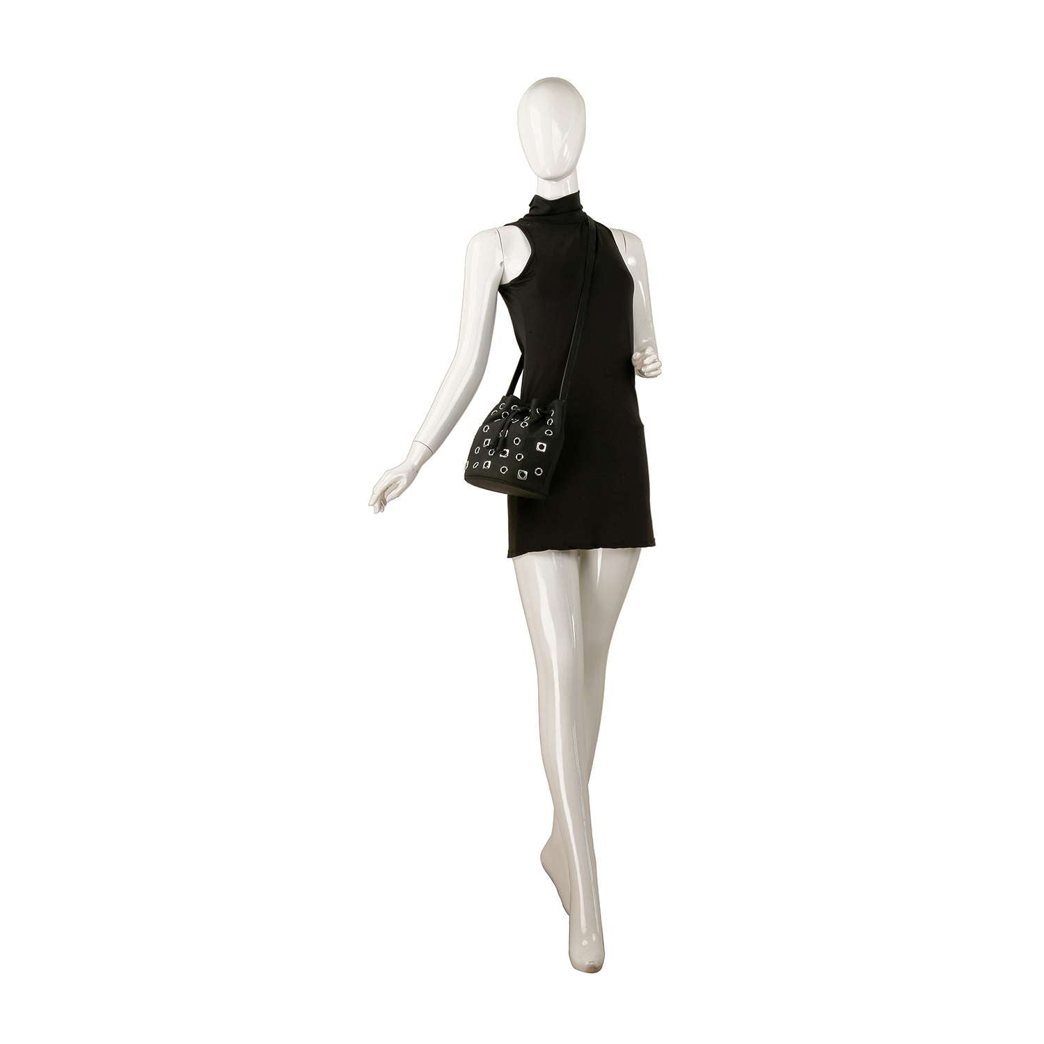 A mannequin in a sleeveless black mini dress carries the Rivited Drawstring Hobo Shoulder Bag with silver-tone hardware, posed on one leg against a plain white background.