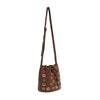The Rivited Drawstring Hobo Shoulder Bag is a brown faux leather bag with a long adjustable shoulder strap, drawstring closure, and silver-tone grommets and hardware.