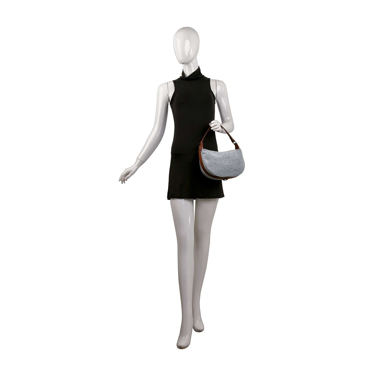 A mannequin in a sleeveless, short black dress holds the Rhinestone Denim Hobo Handbag, posed against a plain white background.