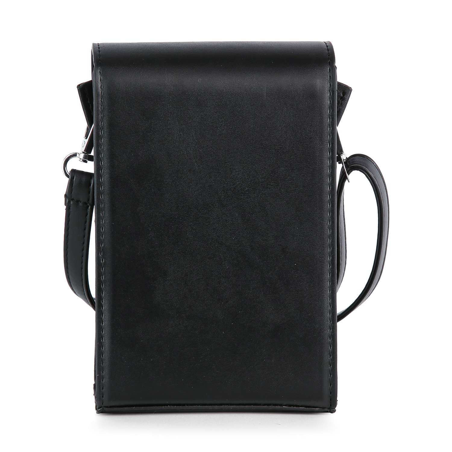 The Decorative Cross Accented Petite Crossbody Bag features black faux leather with a smooth finish, a flap closure, and a thin shoulder strap attached on the right side.