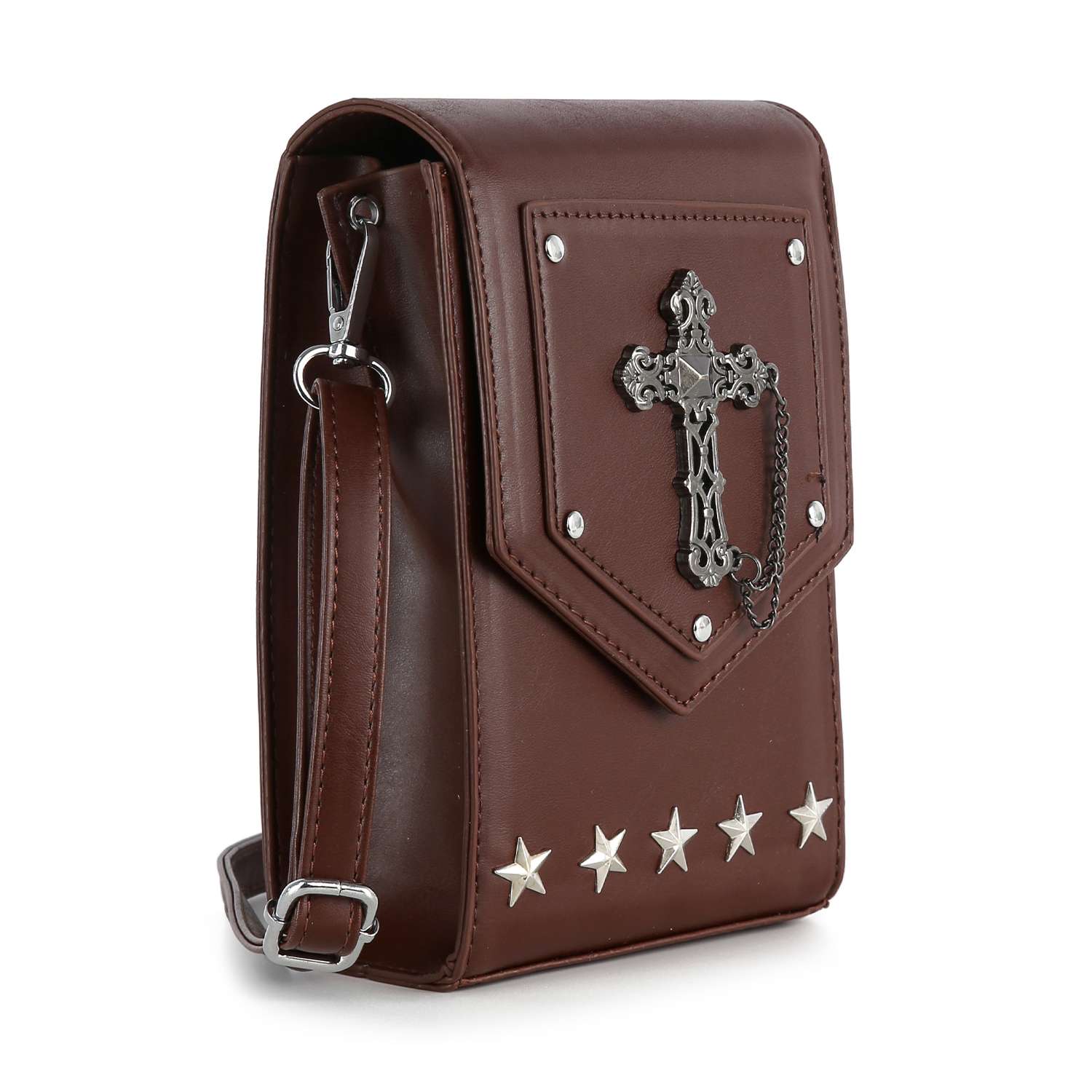 The Decorative Cross Accented Petite Crossbody Bag showcases a brown faux leather design with a front metal cross medallion, chain, five silver star studs at the bottom, silver clasp, and an adjustable strap.