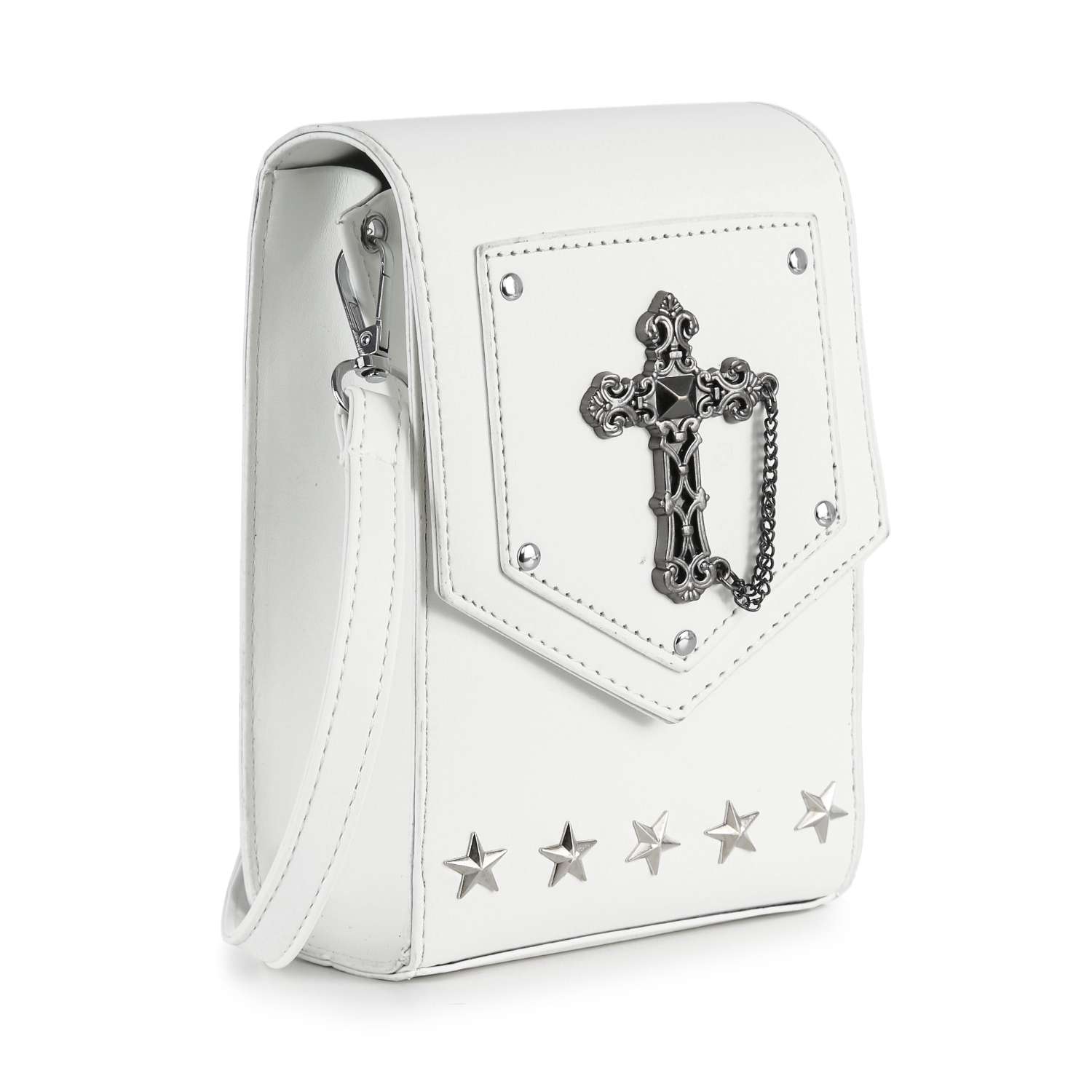 The Decorative Cross Accented Petite Crossbody Bag is a small white faux leather crossbody featuring a metal cross medallion with chain detail on the flap and five silver star studs along the bottom edge.