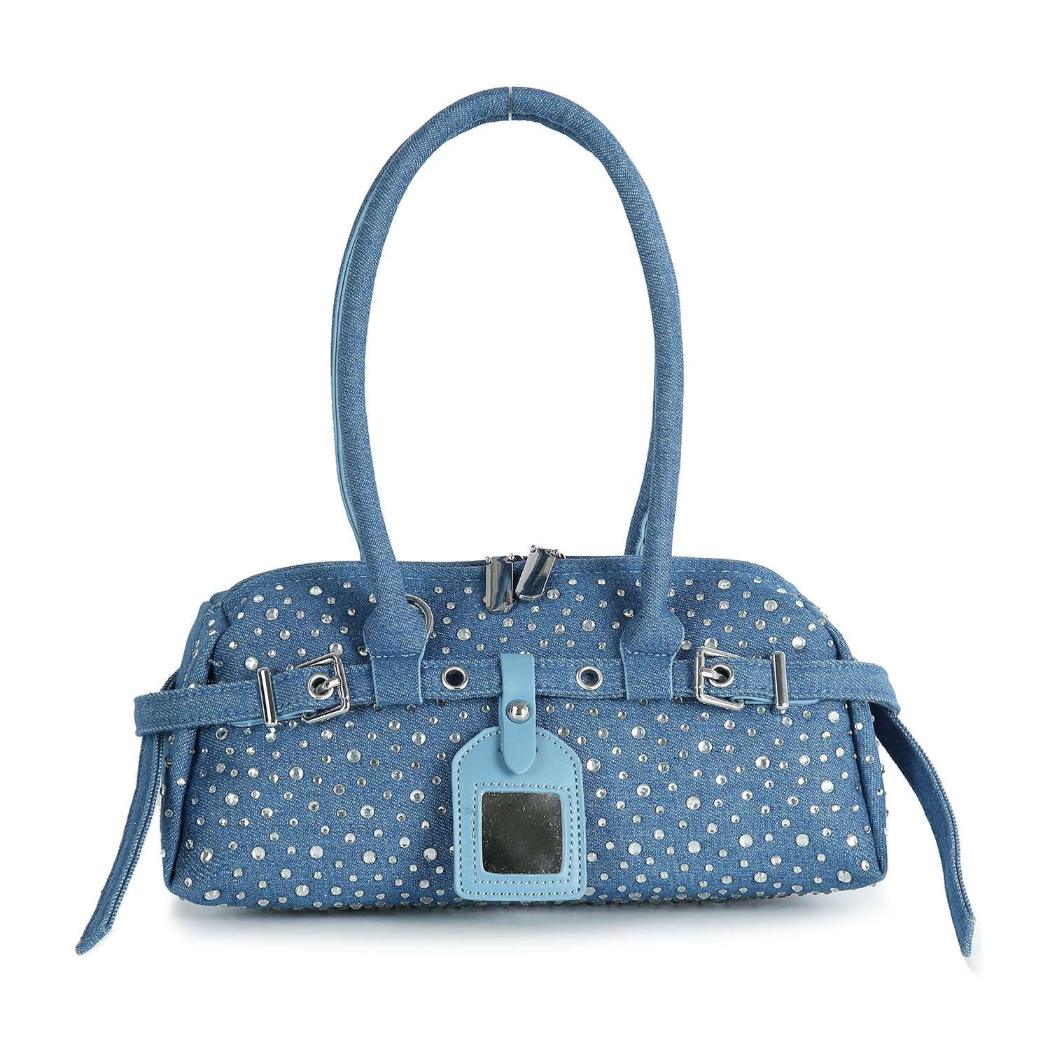 The Rhinestone Belted Hand Tote is a blue denim handbag with two handles, silver stud accents, decorative belts, and a blue leather front tag.