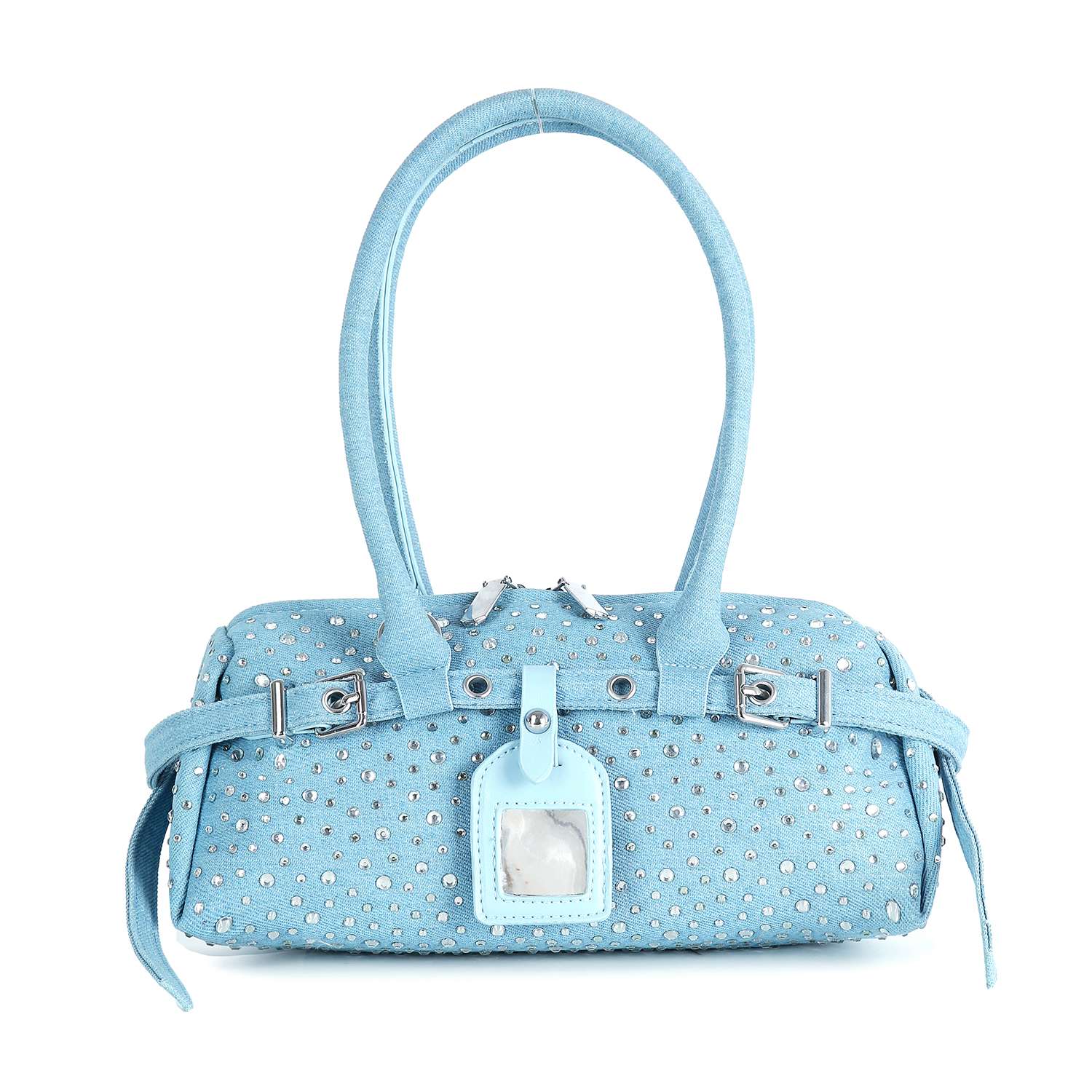 The Rhinestone Belted Hand Tote is light blue with two handles, silver studs, buckles, a center tag, a textured surface, and a structured rectangular shape.