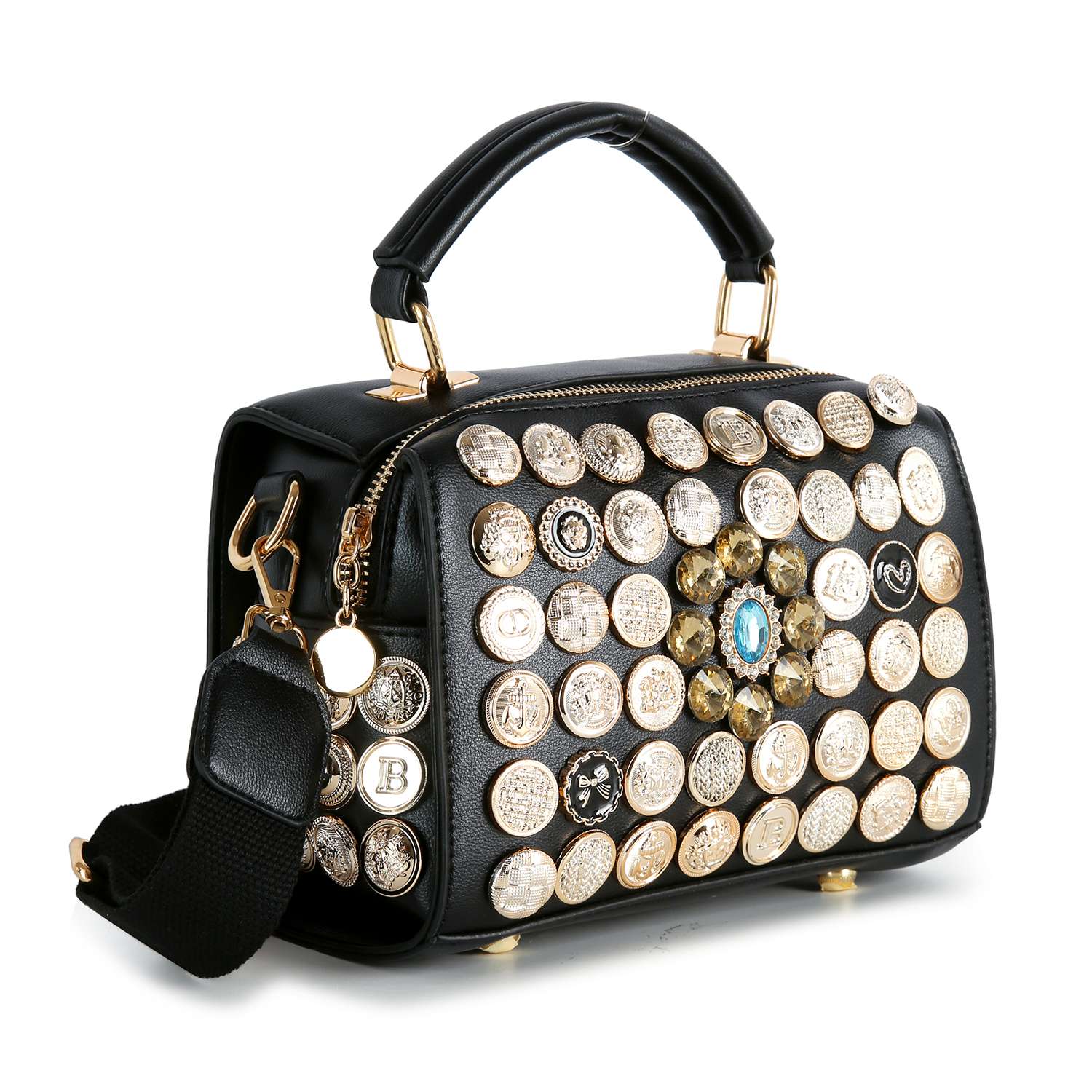 The Intricate Button Design Satchel Handbag is a black faux leather bag with gold-tone hardware, ornate gold and silver button embellishments, a top handle, and a detachable shoulder strap.