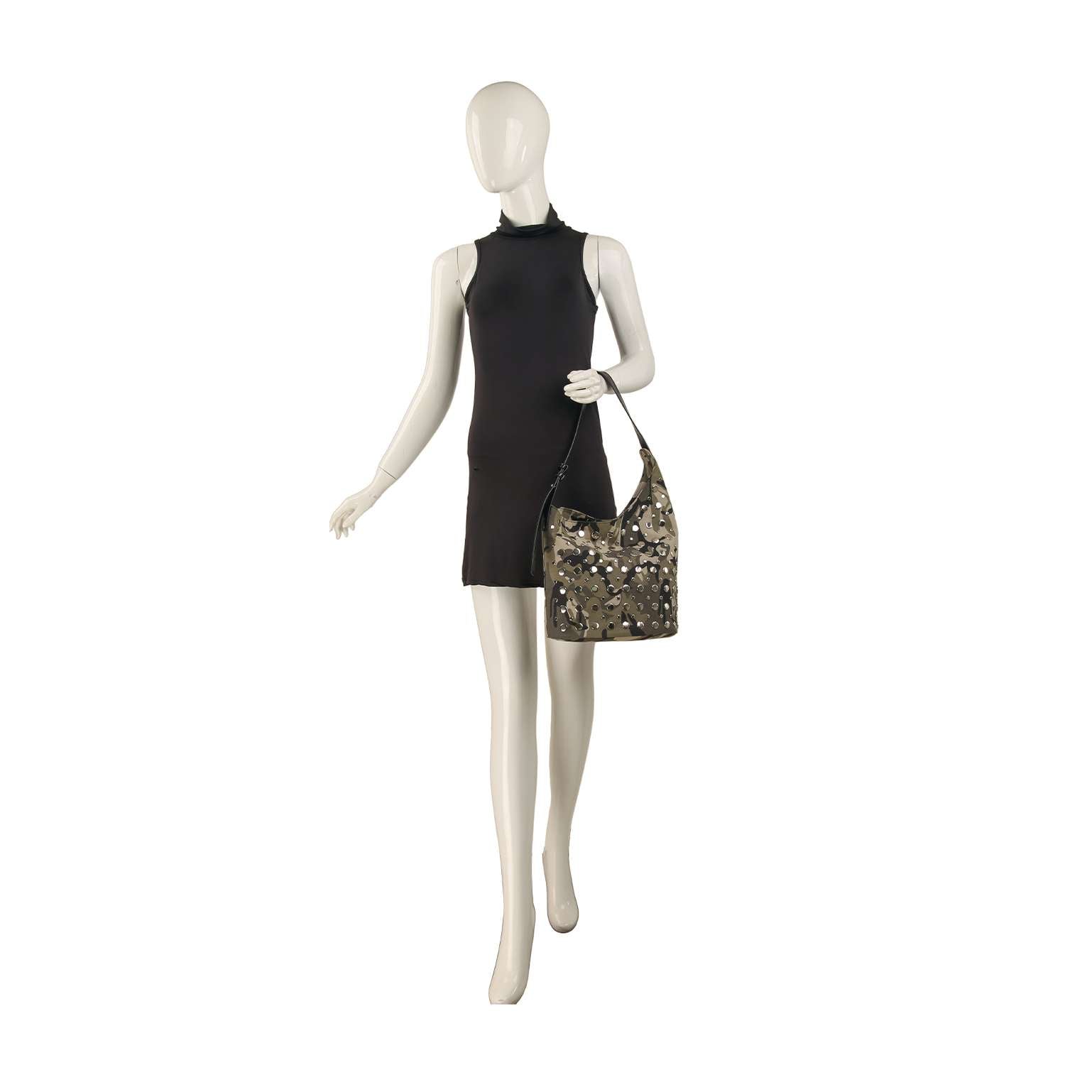 A mannequin in a sleeveless black mini dress holds the Camo Print Unique Hobo Design Handbag, posed as if walking against a plain white background.