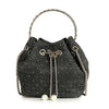 The Denim Tiny Stone Accented Drawstring Bag is a small black crossbody purse with a chain handle, silver butterfly detail, and two faux pearl beads on the drawstring ends.