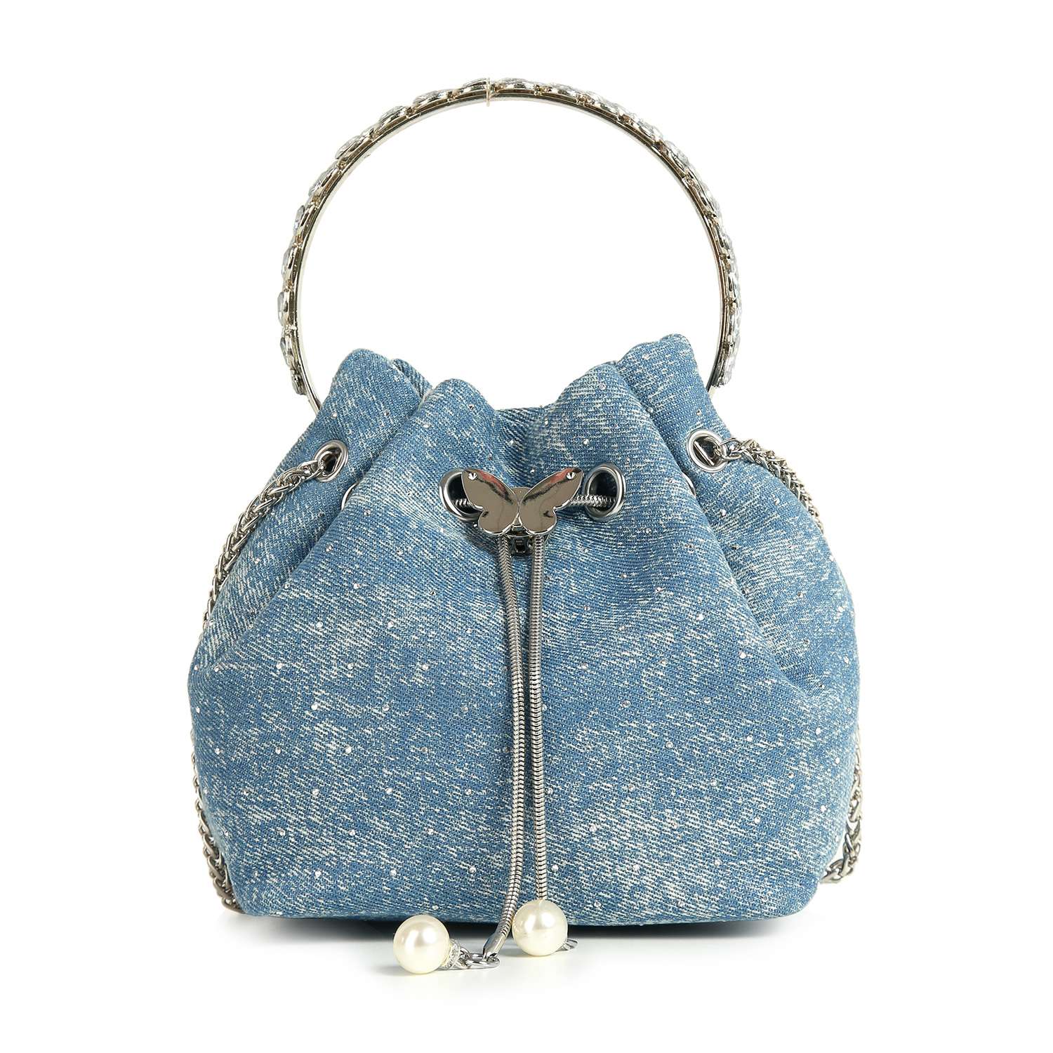 The Denim Tiny Stone Accented Drawstring Bag features a chic drawstring design, silver circular handle, butterfly detail, chain accents, and pearl charms—perfect as a stylish crossbody purse for any occasion.