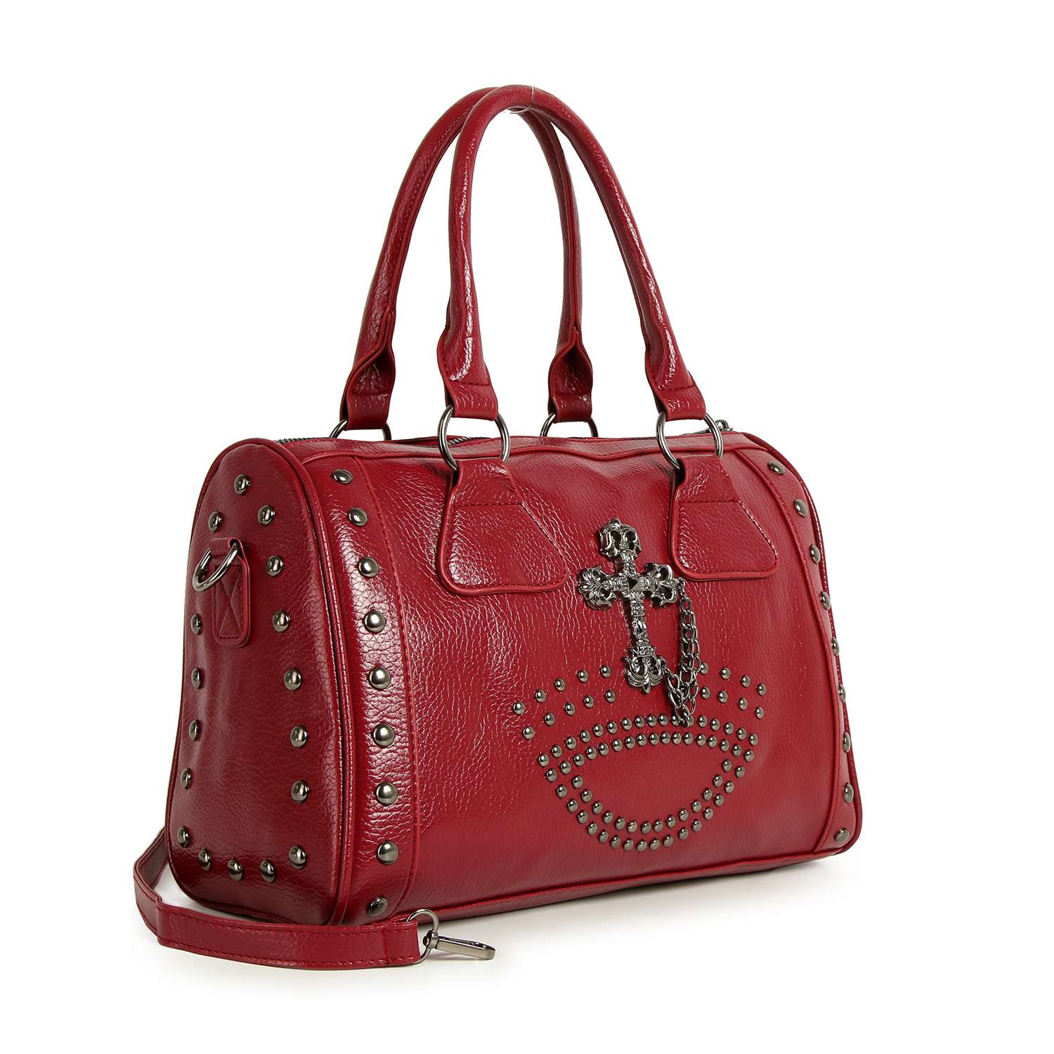 The Cross And Stud Accented Petite Satchel Handbag is a red faux leather bag with double handles, silver edge studs, a cross and curved front metal accent, plus a detachable strap for versatile carrying.