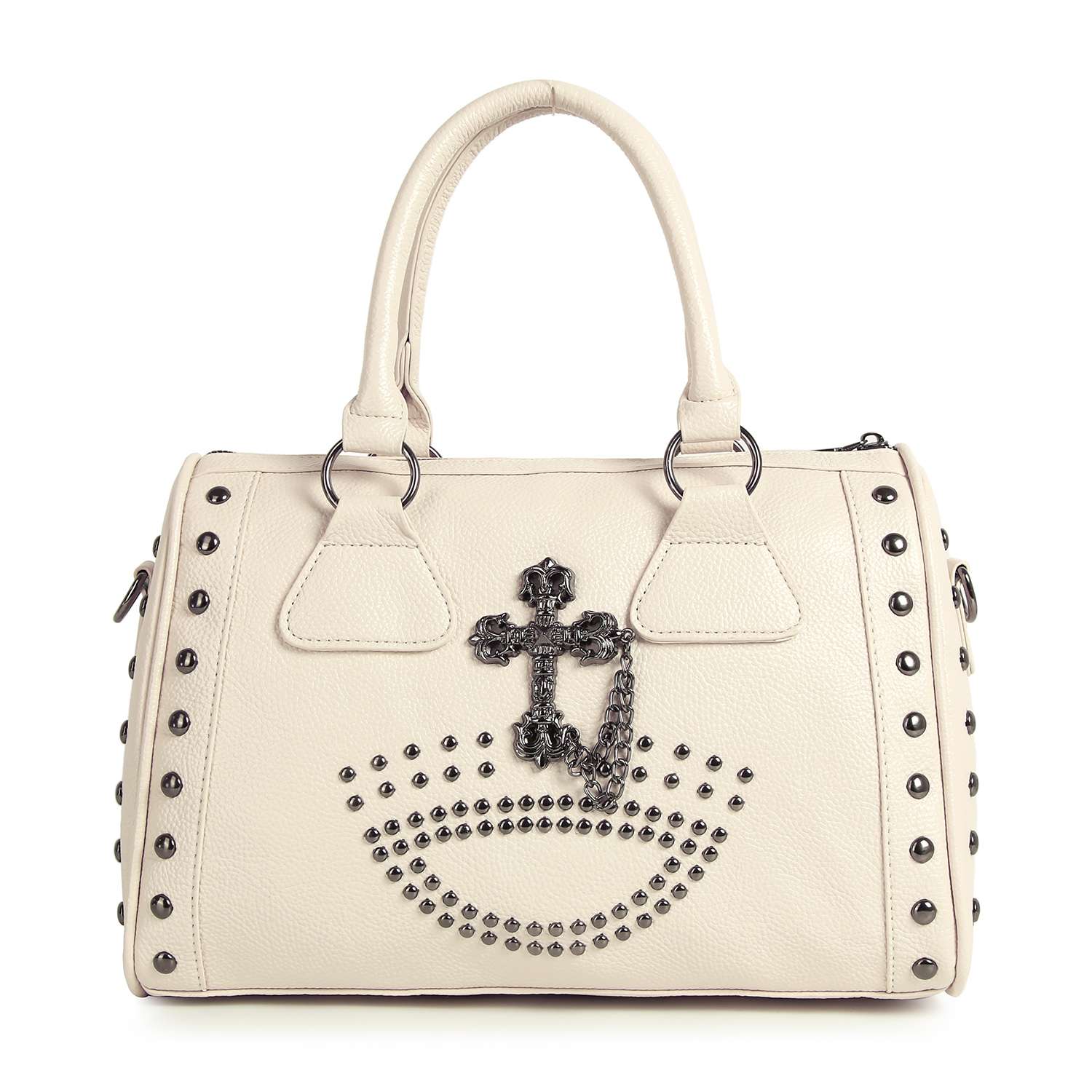 The Cross And Stud Accented Petite Satchel Handbag features cream-colored faux leather, double handles, and metal studs arranged in a cross and semicircle on the front, with extra stud accents along the edges.