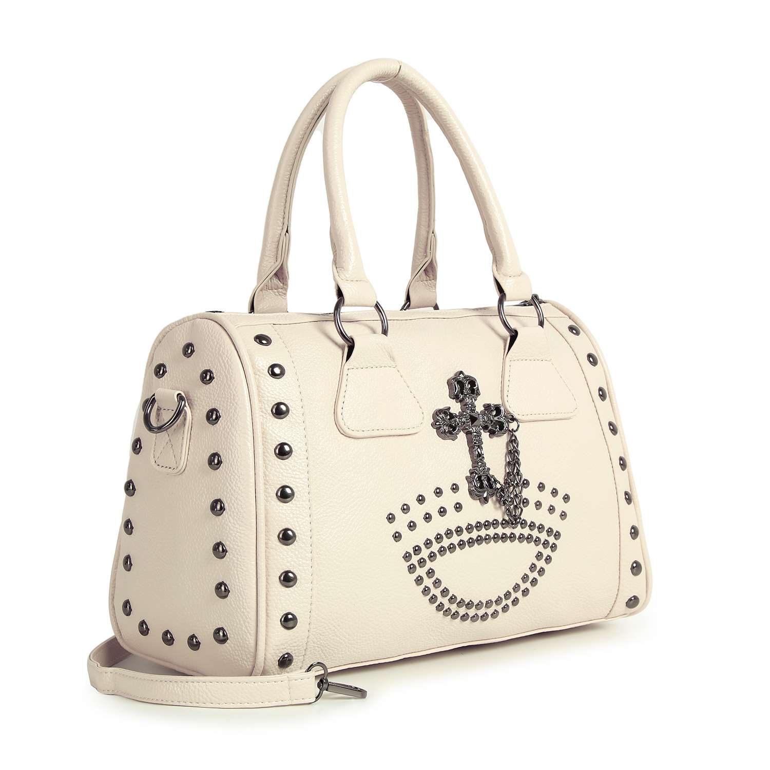 The Cross And Stud Accented Petite Satchel Handbag is cream-colored faux leather with silver studs, double handles, and metal hardware. A black studded cross and crown design accents the front. Includes a detachable strap for versatile carry.