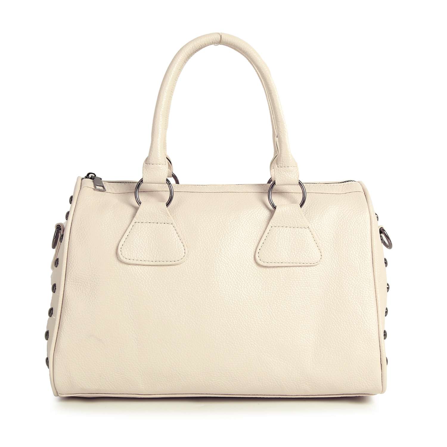 The Cross And Stud Accented Petite Satchel Handbag is a beige faux leather bag with double handles, metal rings, and side stud accents. It features a structured rectangular silhouette and a minimalist design.