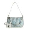 The Denim And Sequin Decorative Hobo is a light blue sequin-covered handbag with a single silver chain strap, silver beads, faux leather trim, and a metallic silver dog-shaped charm on the chain.