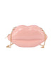 The Kissable Lip Jelly Shoulder Bag is a shiny, pink, lip-shaped faux leather handbag with a gold chain strap and zip closure, shown on a white background.