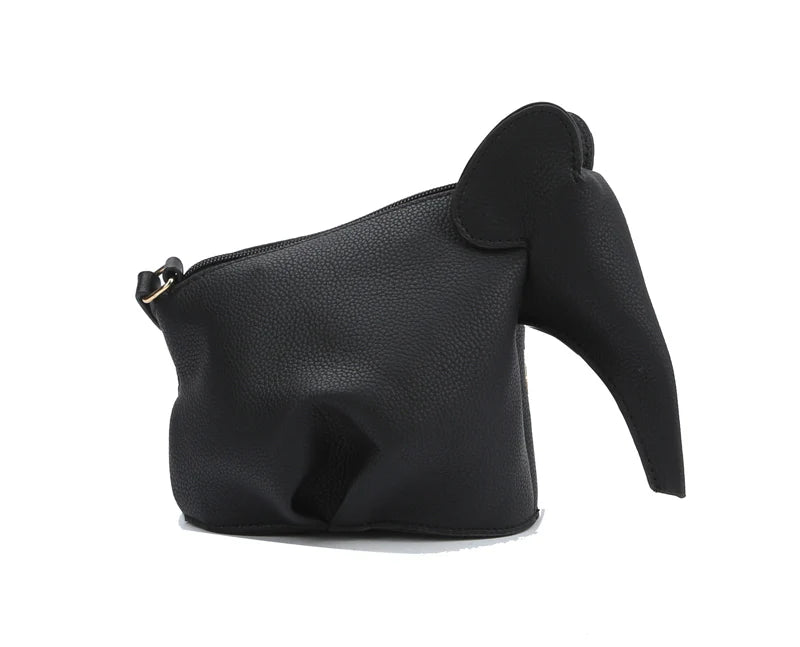 The Unique Elephant Design Shoulder Bag is a black faux leather handbag styled like an elephant, with a trunk-shaped front, ear details, and a top zip closure, shown against a white background.