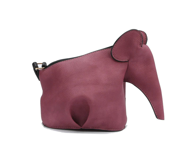 The Unique Elephant Design Shoulder Bag is a maroon faux leather pouch with a top zip, shaped like an elephant with trunk, ears, and subtle leg and tail details.