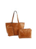 The Whipstitch Accented Luxurious Tote Set features three tan brown faux leather bags—a large two-handle tote, a medium tablet-friendly purse, and a small zip pouch—all displayed on a white background.