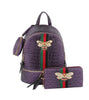 The Decorative Bee Backpack Set includes a purple faux leather backpack with a jeweled bee brooch, green and red stripe, matching wallet, and a small round side pouch.
