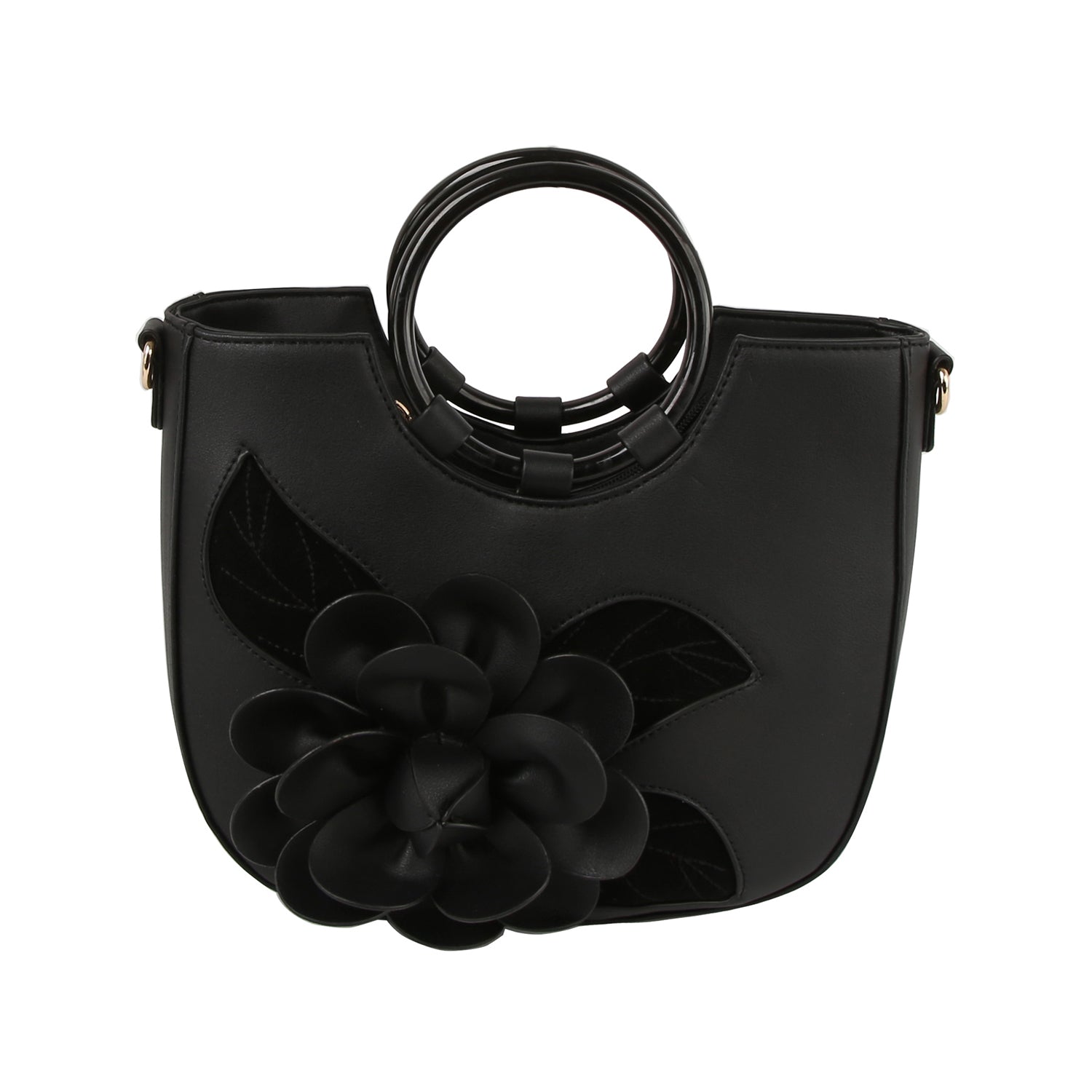 The Raised Flower Tote Handbag is a black faux leather bag with round handles, gold toned hardware, a striking 3D flower and leaf design on the front, and a detachable strap for versatile styling.