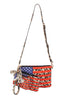 The American Flag 3 Piece Crossbody Set features a crossbody bag and keychain pouch with an American flag over leopard print, plus a matching adjustable strap and tassel accent for extra style.