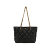 The Quilted Puffer Stylish Chain Accented Tote is a black quilted nylon handbag with gold-tone hardware, double handles, and a gold rectangular clasp, displayed against a plain white background.