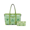 The Crest Emblem Classic Tote is a large green handbag with long handles, a matching wallet, and a detachable crossbody bag, all featuring white, green, and navy crest designs on a light green background.