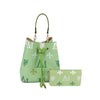 The 2 in 1 Monogram Print Faux Leather Bucket Bag is a light green bucket bag with drawstring closure and matching wallet, both featuring white, gold, and dark green fleur-de-lis and M monogram patterns.