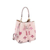 The 2 in 1 Monogram Print Faux Leather Bucket Bag features a pink bucket style with top handle and shoulder strap, decorated with pink and purple fleur-de-lis and M patterns, plus a stylish drawstring closure.