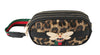 The Rhinestone Bee Leopard Print Crossbody Bag features faux leather, a leopard print, green-and-red adjustable strap, gold zippers, and a jeweled bee brooch on the front.